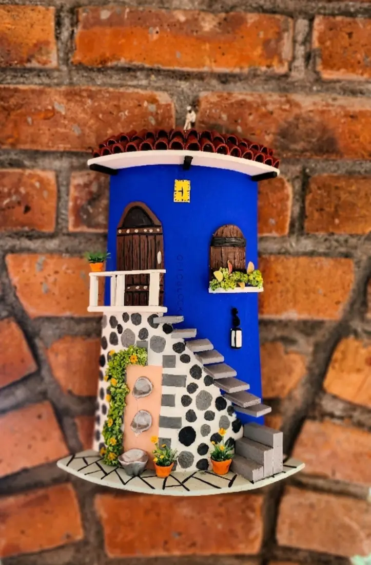 Local Salvadoran artwork displayed at Villa del Sol Garden